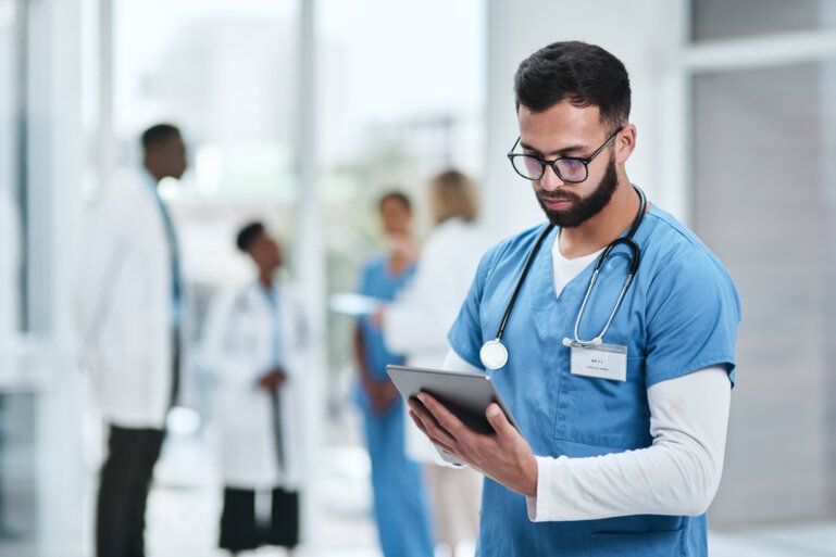 Doctors_reading_tablet 1